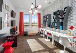 A children's playroom with a red and white color scheme.